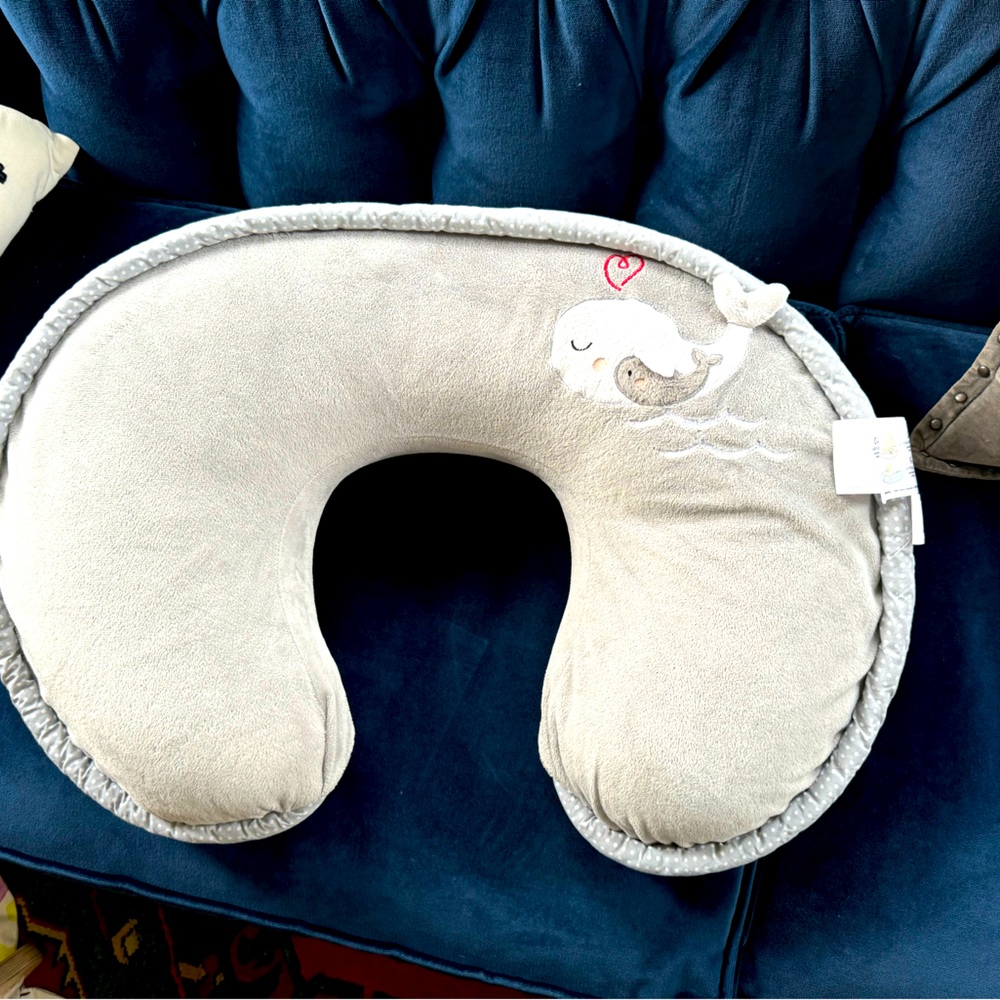 Boppy nursing pillow with two covers